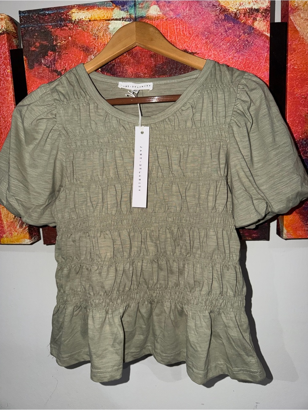 Olive Green Smocked Peplum Puff-Sleeve Top. Size: S